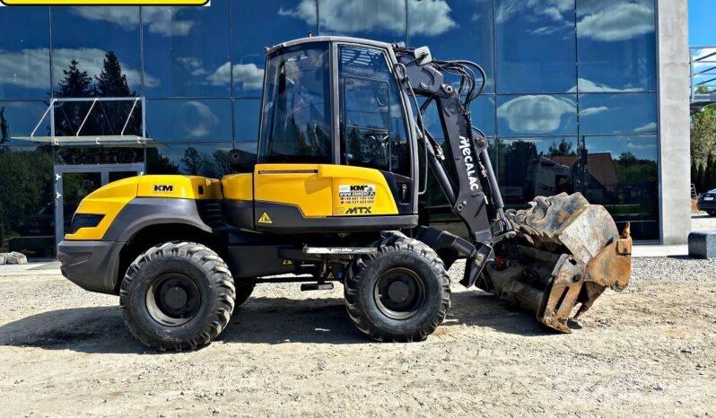 Mecalac 12 M TX 反鏟裝載機