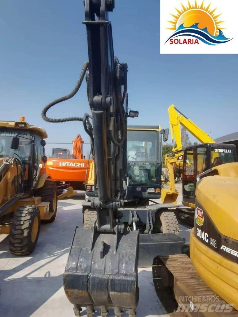 Hyundai R60W vs 小型挖土機/掘鑿機<7t(小型挖掘機)