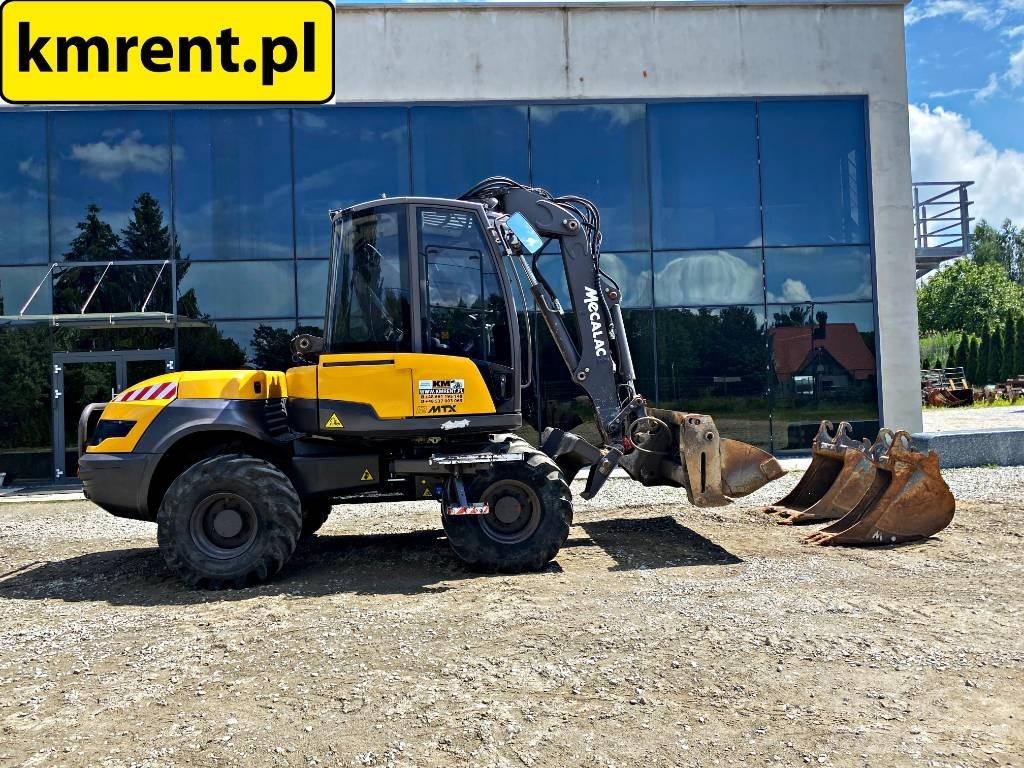 Mecalac 12 M TX 反鏟裝載機