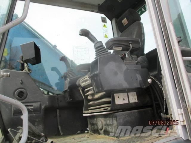 Fuchs MHL 320 廢棄物/工業用操作車