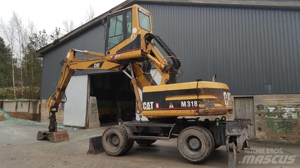 CAT M 318 廢棄物/工業用操作車