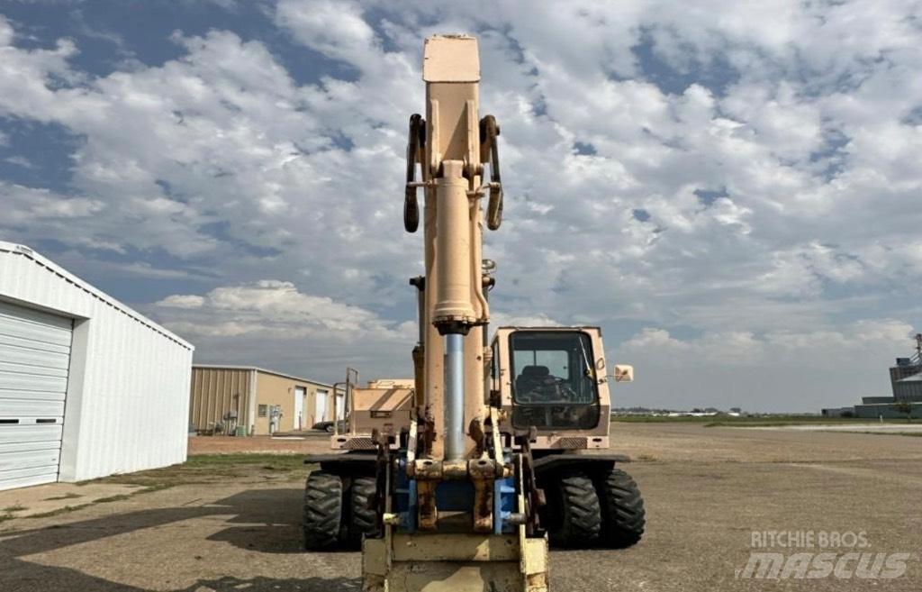 John Deere 595 旋轉式挖土機/掘鑿機/挖掘機