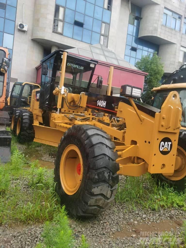 CAT 140 H 反鏟裝載機