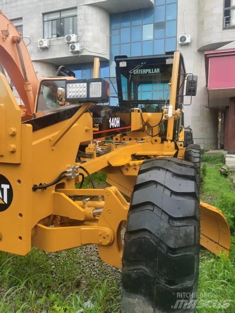CAT 140 H 反鏟裝載機