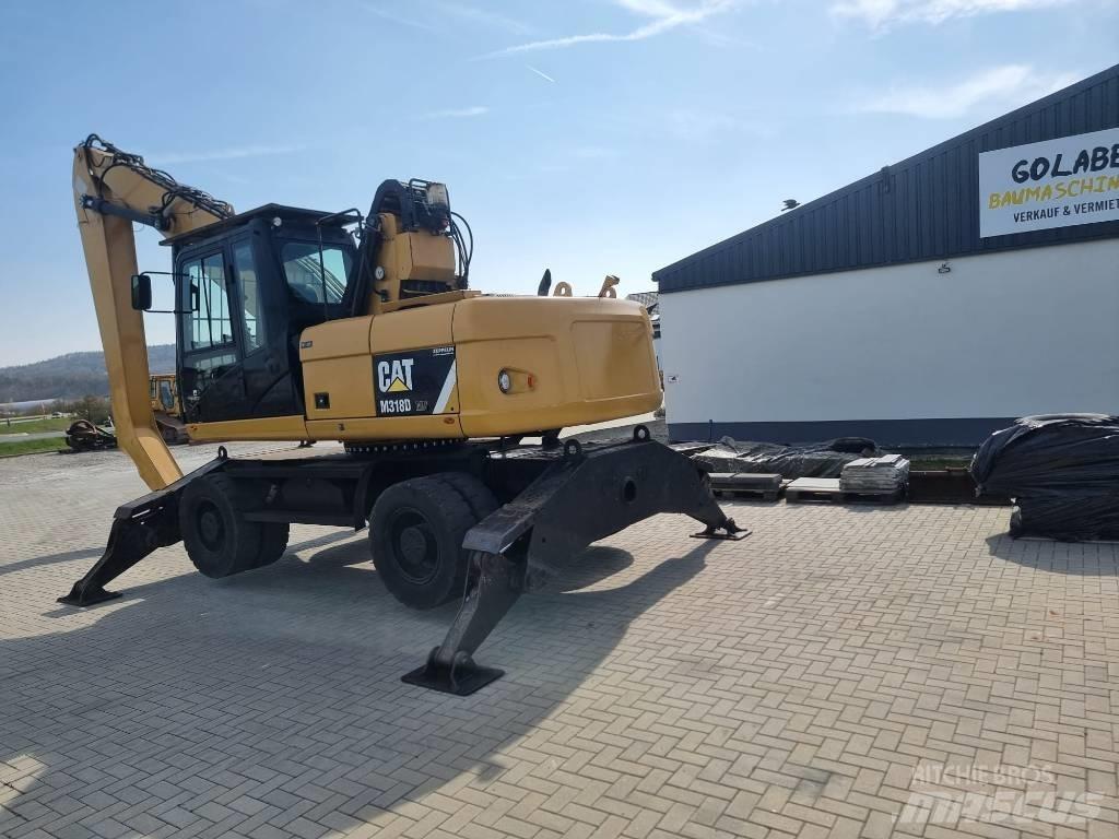 CAT 318D 廢棄物/工業用操作車