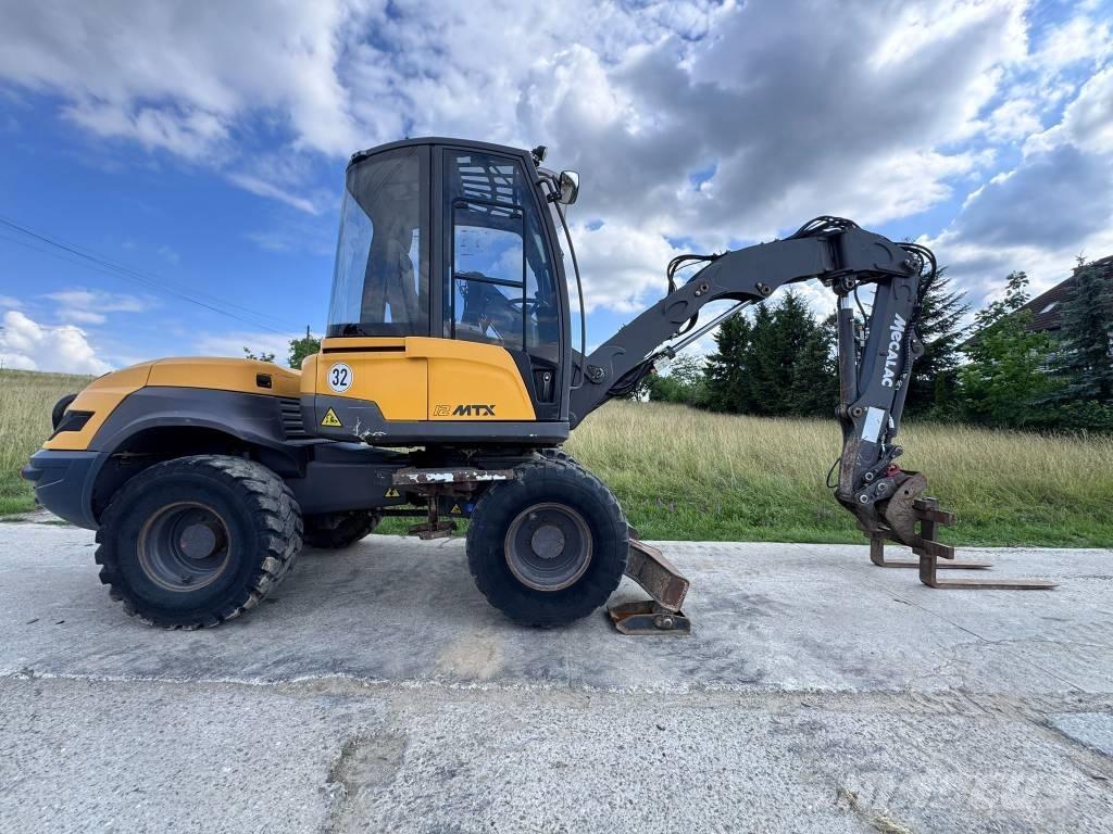 Mecalac 12 MTX 反鏟裝載機