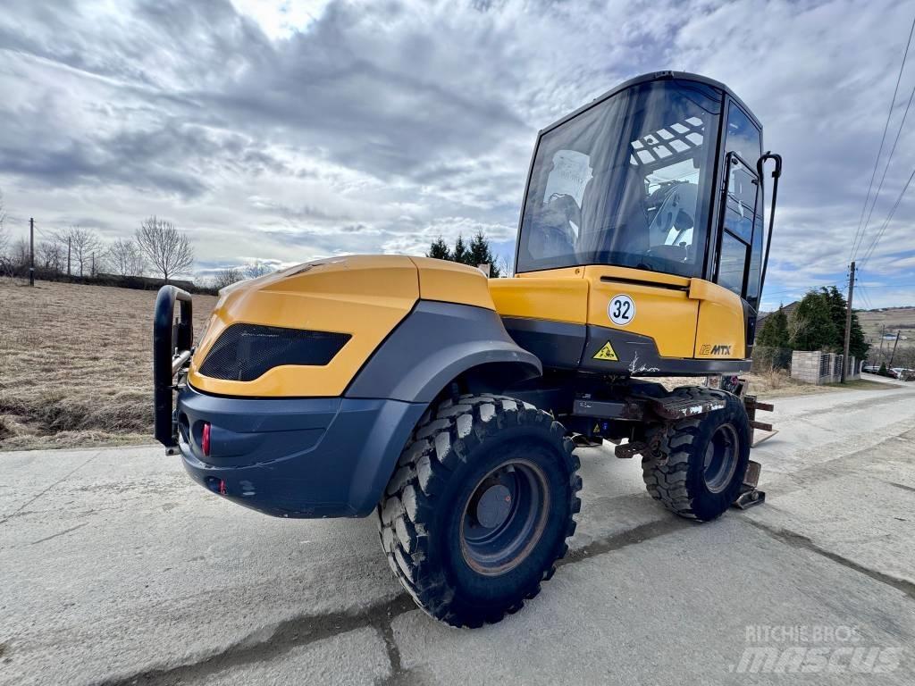 Mecalac 12 M TX 反鏟裝載機