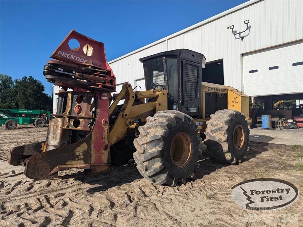 CAT 553 伐木歸堆機